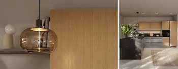 Detailaufnahme einer modernen Küche mit runder Glasleuchte, Holzfronten und dunkler Kücheninsel. Elegantes Design mit warmen Materialien, stilvollen Oberflächen und hochwertiger Küchenausstattung.